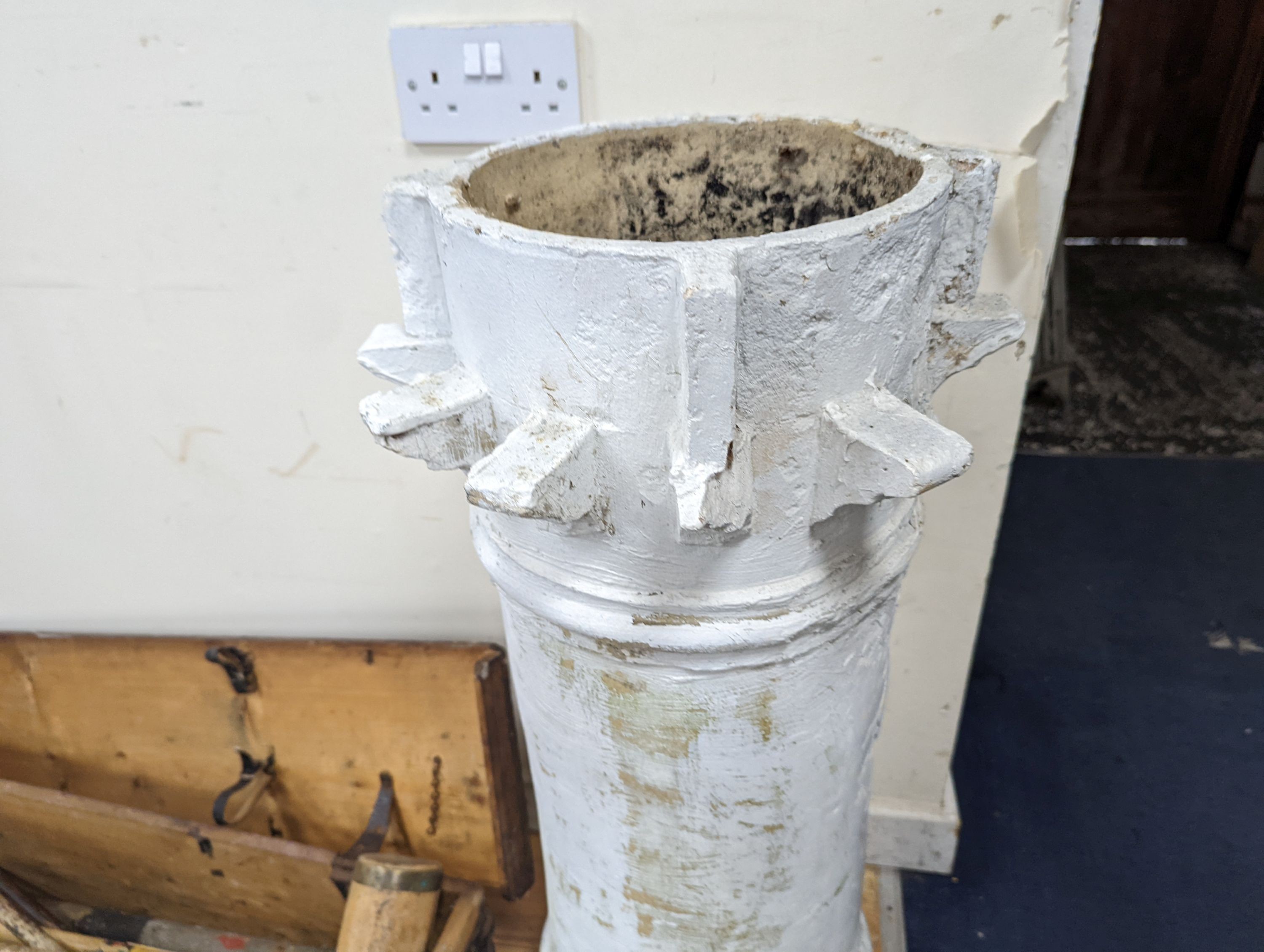 A white painted terracotta chimney pot, height 88cm